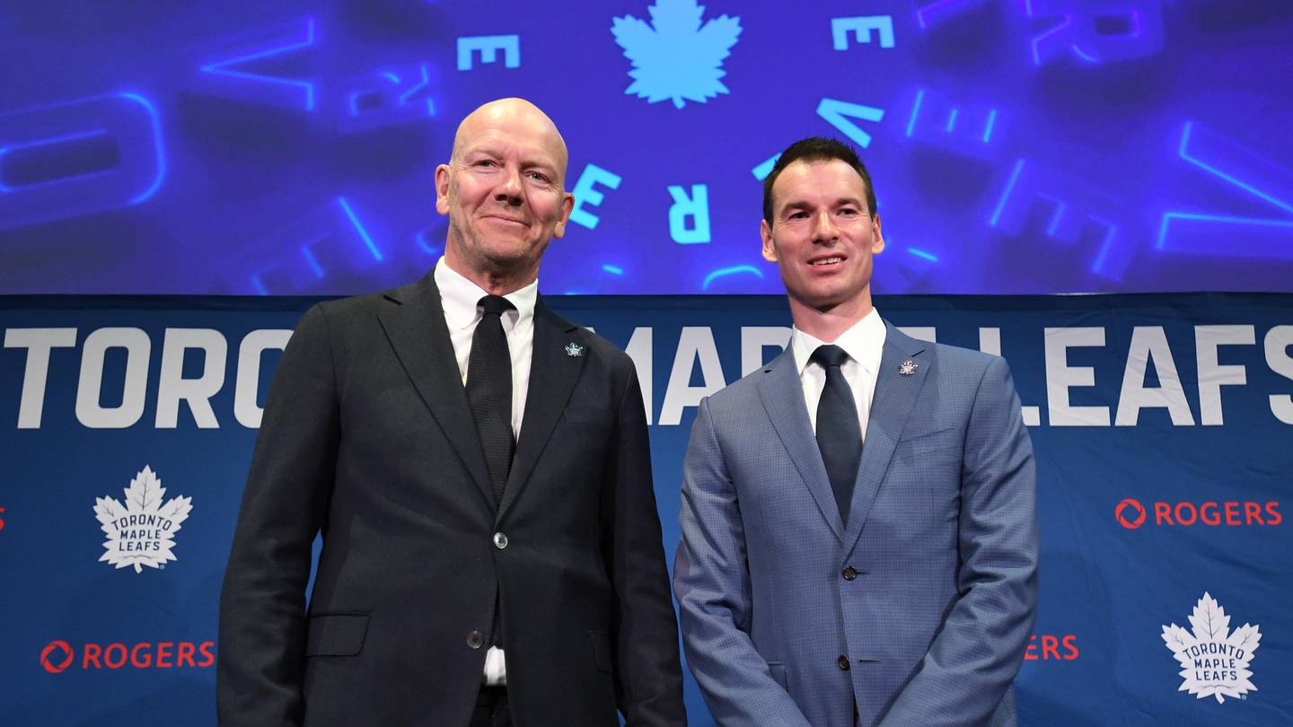 May 4, 2026; Toronto, Ontario, CANADA;  Toronto Maple Leafs new senior executive advisor Mats Sundin (l) and general manager John Chayka pose for picture after an introductory news conference at Real Sports Bar and Grill. Mandatory Credit: Dan Hamilton-Imagn Images