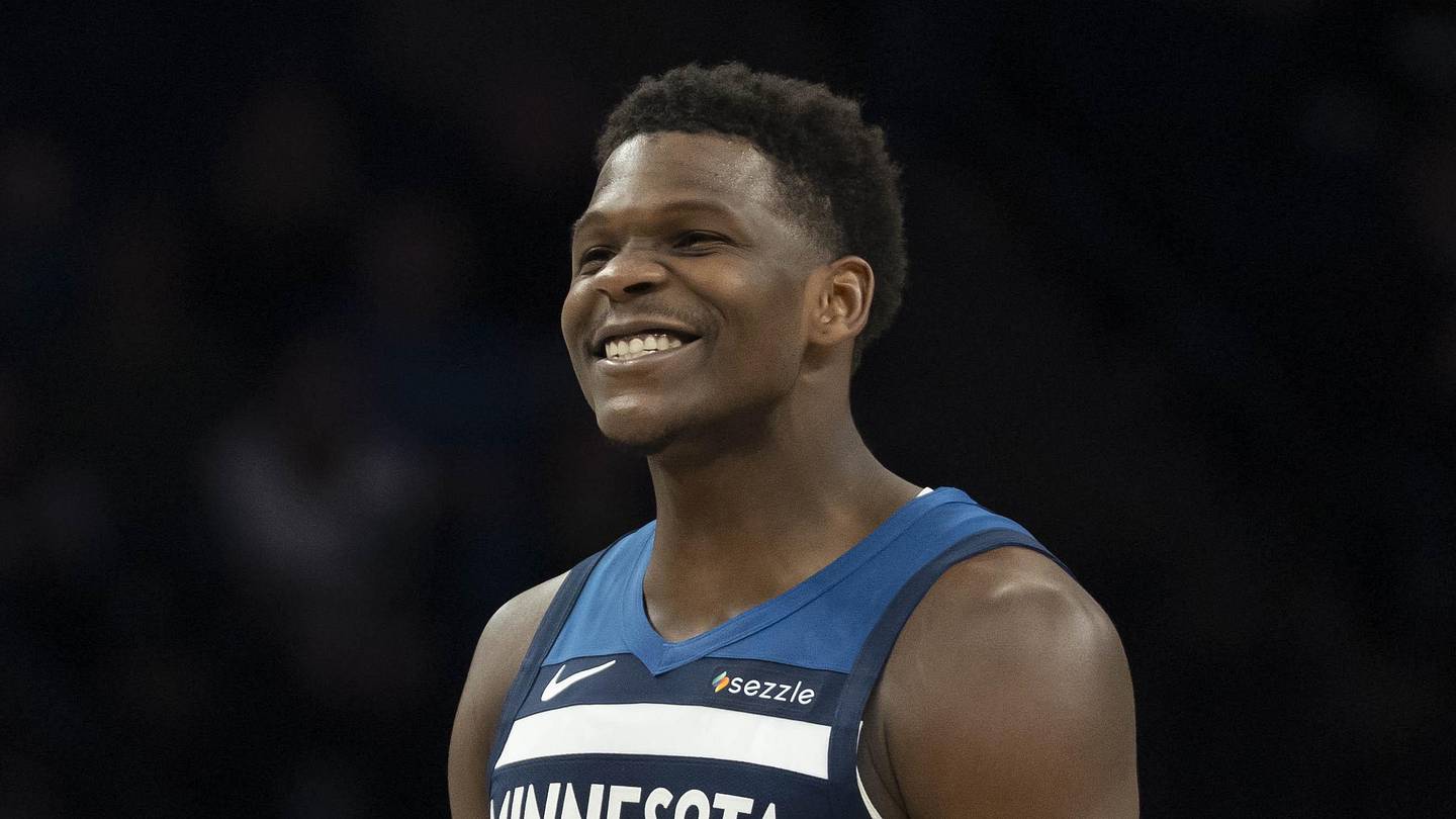 Feb 11, 2026; Minneapolis, Minnesota, USA; Minnesota Timberwolves guard Anthony Edwards (5) celebrates Minnesota Timberwolves forward Julius Randle (not pictured) making a shot against the Portland Trail Blazers in the second half at Target Center. Mandatory Credit: Jesse Johnson-Imagn Images