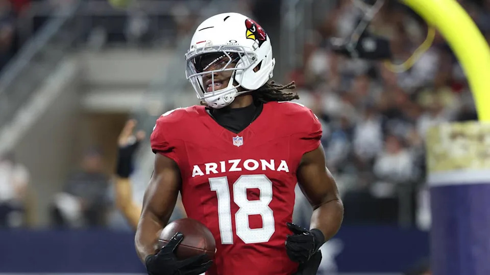 Nov 3, 2025; Arlington, Texas, USA; Arizona Cardinals wide receiver <a class="link " href="https://sports.yahoo.com/nfl/players/40893/" data-i13n="sec:content-canvas;subsec:anchor_text;elm:context_link" data-ylk="slk:Marvin Harrison Jr.;sec:content-canvas;subsec:anchor_text;elm:context_link;itc:0" data-yga="{"yLinkElement":"context_link","yModuleName":"content-canvas","yLinkText":"Marvin Harrison Jr.","ySubModuleName":"anchor_text","yHasCommerce":false}">Marvin Harrison Jr.</a> (18) scores a touchdown against the <a class="link " href="https://sports.yahoo.com/nfl/teams/dallas/" data-i13n="sec:content-canvas;subsec:anchor_text;elm:context_link" data-ylk="slk:Dallas Cowboys;sec:content-canvas;subsec:anchor_text;elm:context_link;itc:0" data-yga="{"yLinkElement":"context_link","yModuleName":"content-canvas","yLinkText":"Dallas Cowboys","ySubModuleName":"anchor_text","yHasCommerce":false}">Dallas Cowboys</a> in the first half at AT&T Stadium. Mandatory Credit: Kevin Jairaj-Imagn Images© Kevin Jairaj-Imagn Images