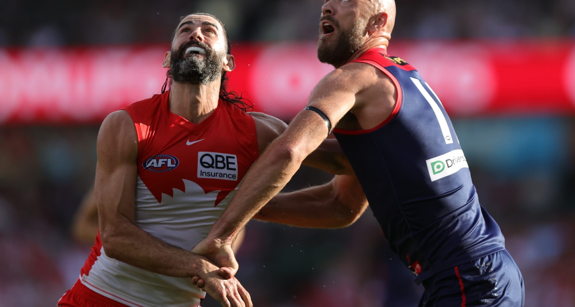 Demons go down fighting in Sydney