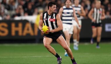 AFL Chairman Craig Drummond congratulates Scott Pendlebury