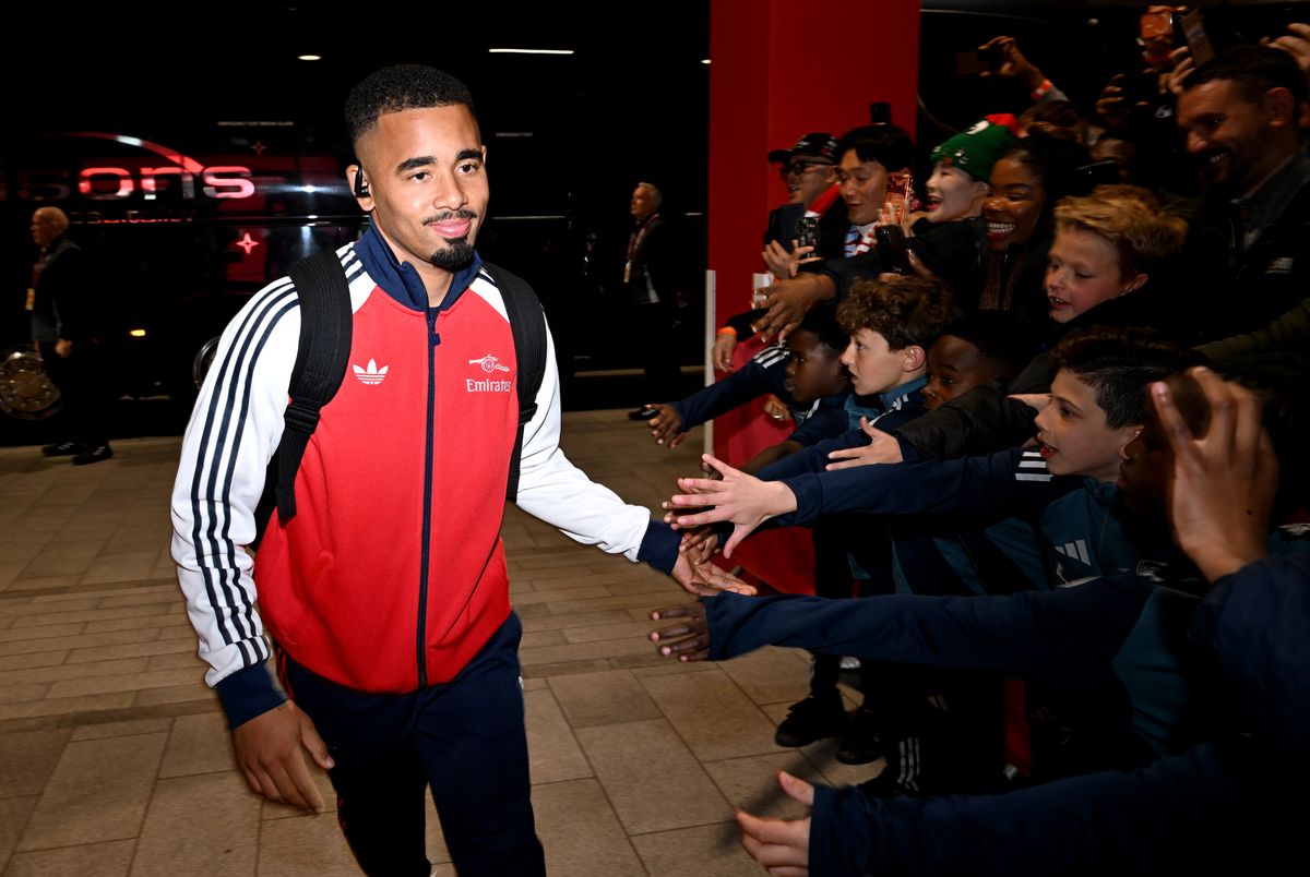 Gabriel Jesus of Arsenal interacts with academy players as he arrives at the stadium prior to the Premier League match between Arsenal and Burnley at Emirates Stadium