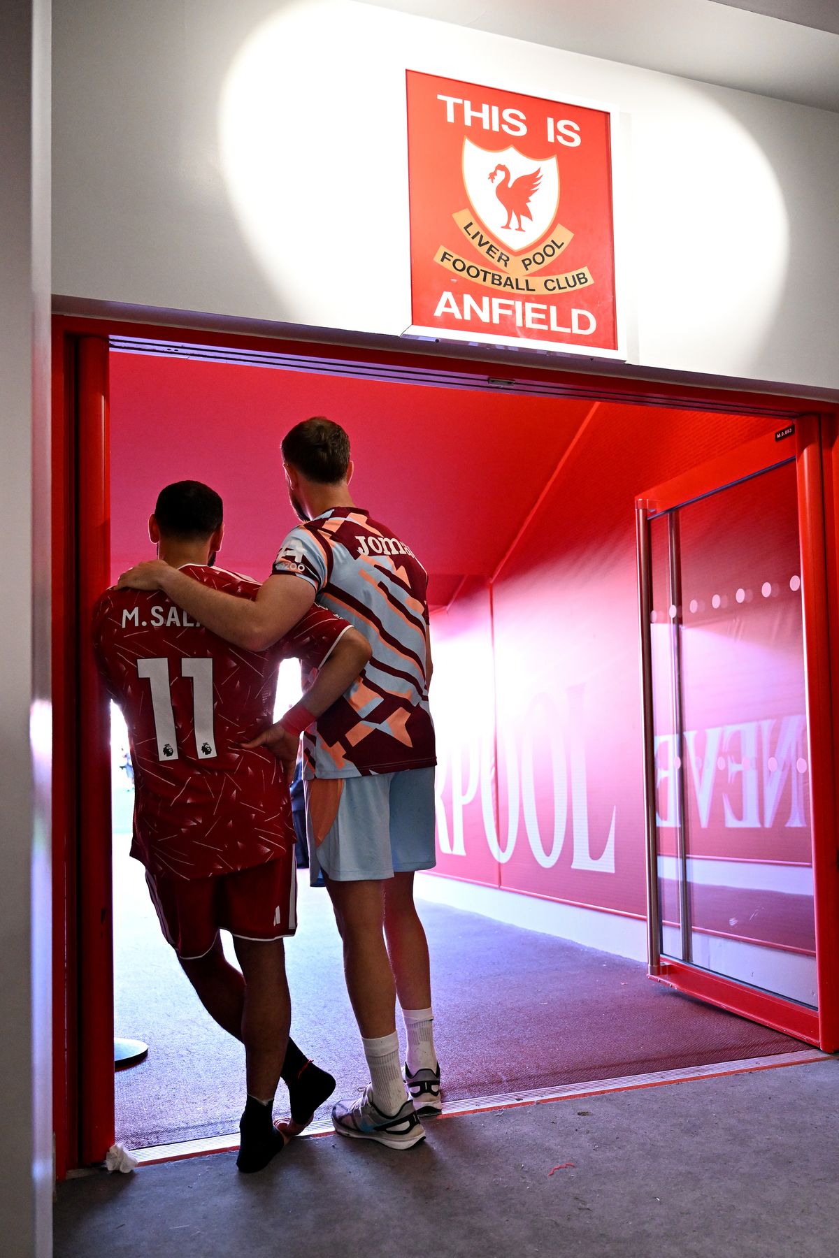 Mohamed Salah and Jordan Henderson in the Anfield tunnel