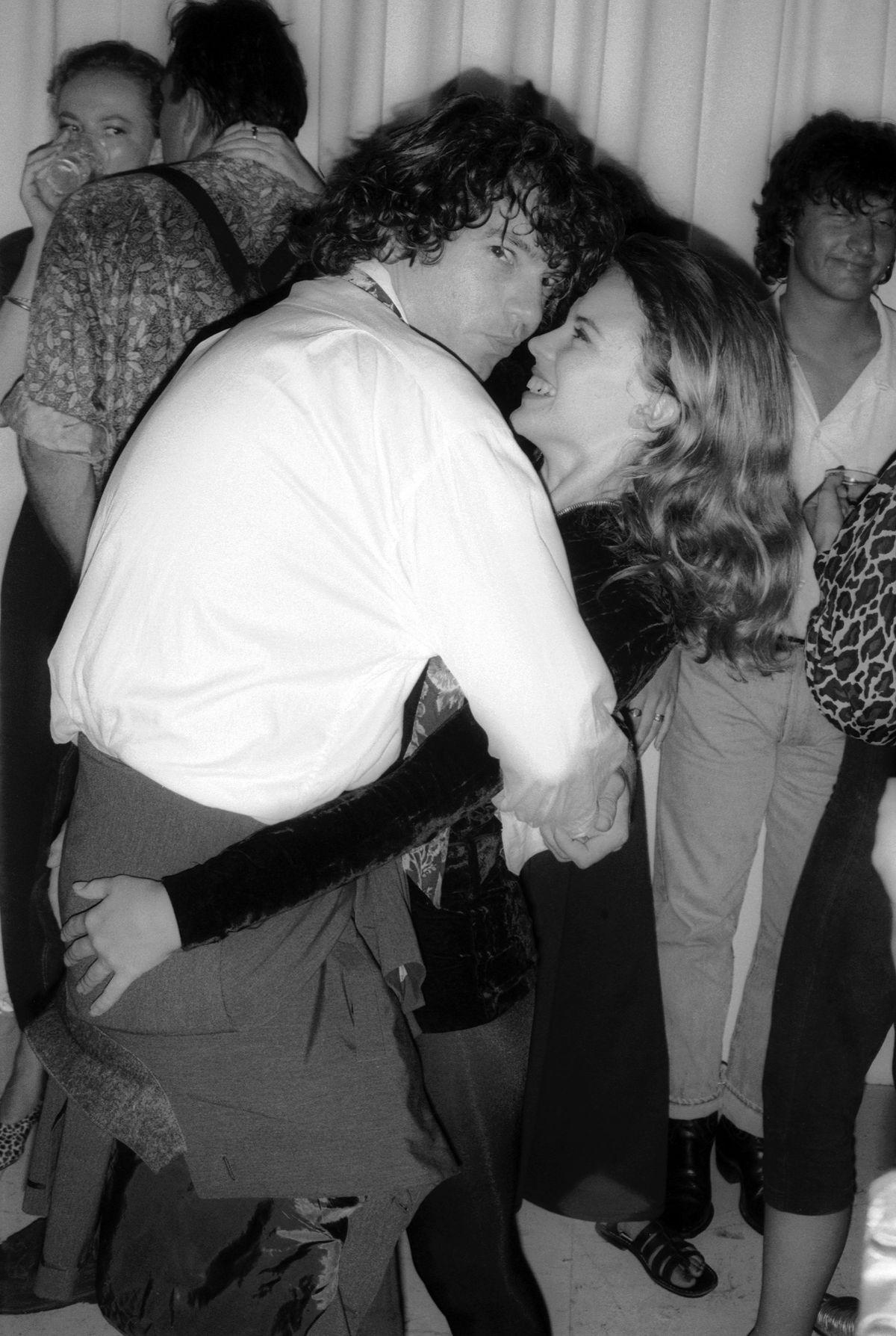 Australian singer Michael Hutchence with Kylie Minogue at a party to celebrate Michael's 30th birthday