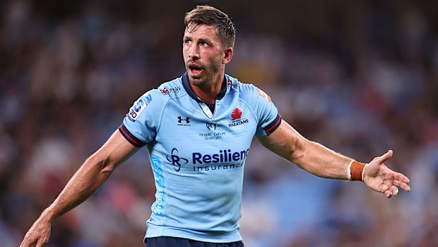Jake Gordon of the Waratahs reacts.