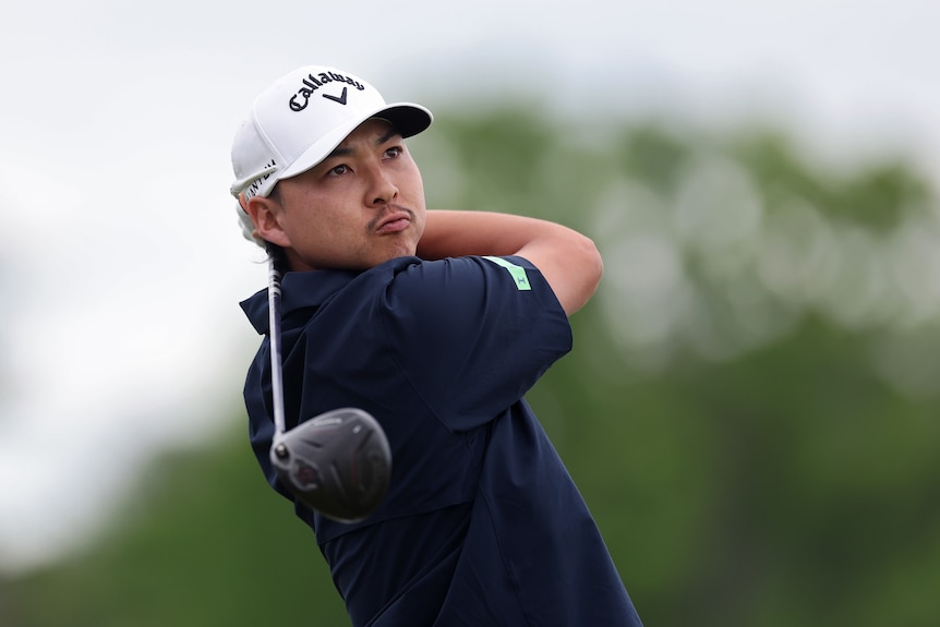 Min Woo Lee swings the golf club