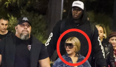 Rap legend Lil’ Kim touches down in Sydney flanked by giant security guards
