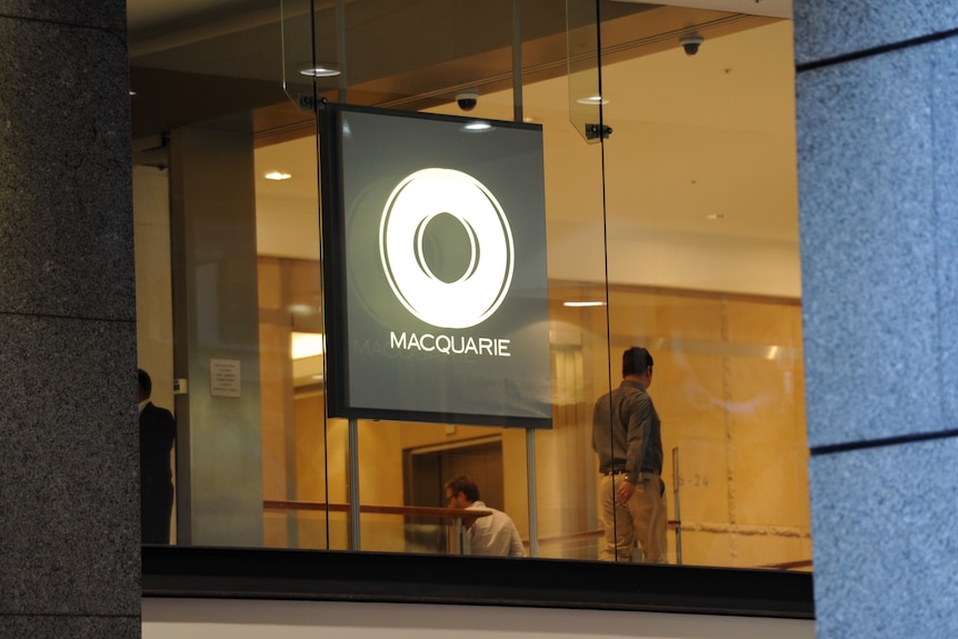 An office worker is seen at the Macquarie Bank offices in central Sydney
