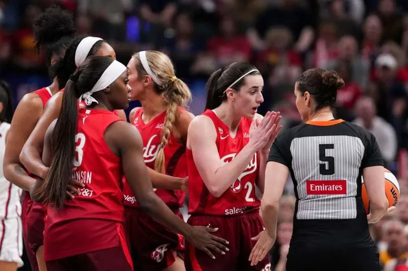 Indiana Fever guard Caitlin Clark (22) speaks with an official Friday, May 15, 2026, during the first half of a game at Gainbridge Fieldhouse in Indianapolis.