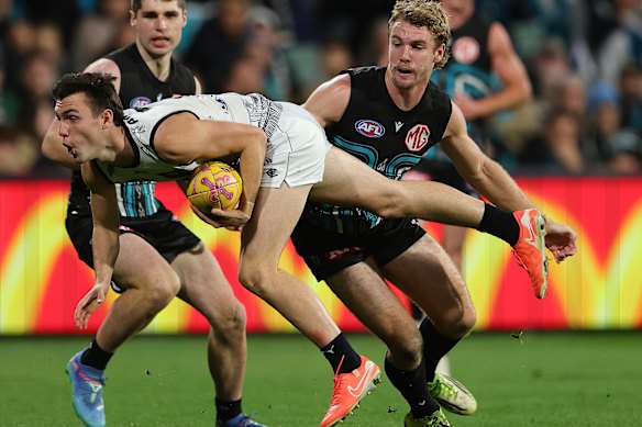 Jagga Smith and Jason Horne-Francis battle for possession.