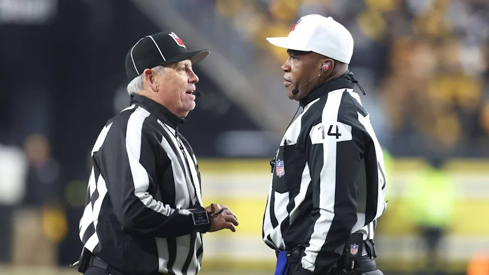 Jan 4, 2026; Pittsburgh, Pennsylvania, USA; NFL line judge Jeff Seeman (left) and referee Shawn Smith (14) discuss a call during the fourth quarter between the <a class="link " href="https://sports.yahoo.com/nfl/teams/baltimore/" data-i13n="sec:content-canvas;subsec:anchor_text;elm:context_link" data-ylk="slk:Baltimore Ravens;sec:content-canvas;subsec:anchor_text;elm:context_link;itc:0" data-yga="{"yLinkElement":"context_link","yModuleName":"content-canvas","yLinkText":"Baltimore Ravens","ySubModuleName":"anchor_text","yHasCommerce":false}">Baltimore Ravens</a> and the <a class="link " href="https://sports.yahoo.com/nfl/teams/pittsburgh/" data-i13n="sec:content-canvas;subsec:anchor_text;elm:context_link" data-ylk="slk:Pittsburgh Steelers;sec:content-canvas;subsec:anchor_text;elm:context_link;itc:0" data-yga="{"yLinkElement":"context_link","yModuleName":"content-canvas","yLinkText":"Pittsburgh Steelers","ySubModuleName":"anchor_text","yHasCommerce":false}">Pittsburgh Steelers</a> at Acrisure Stadium. Mandatory Credit: Charles LeClaire-Imagn Images© Charles LeClaire-Imagn Images&period;