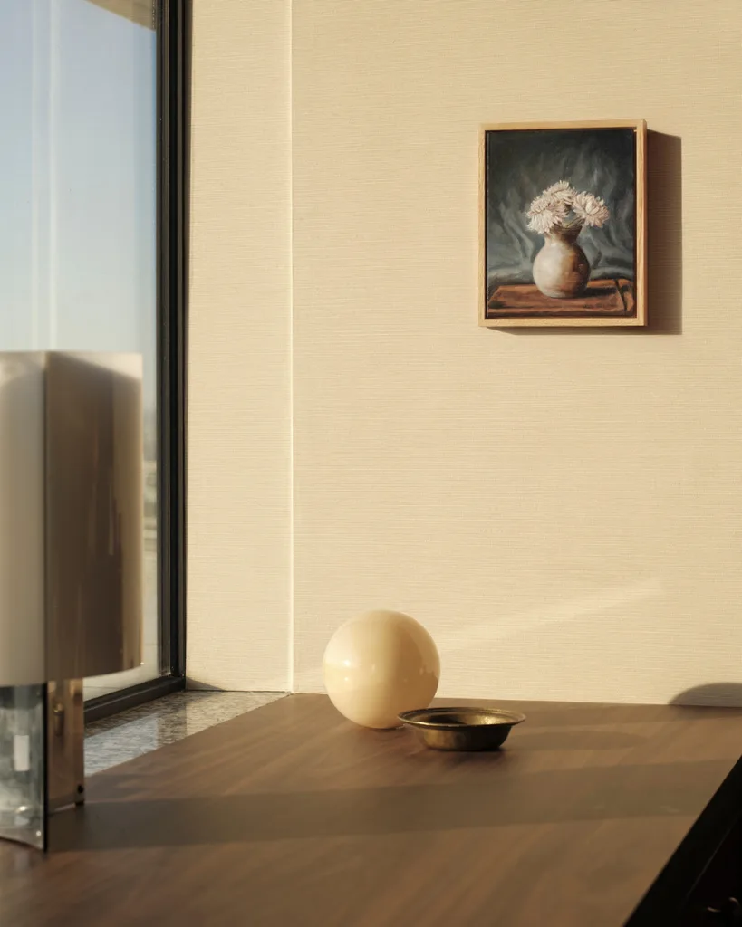 A desk overlooking city with minimalist palette overlooking city