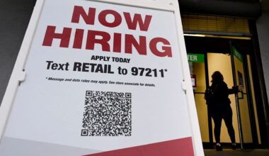 Retailers hire big, defying consumer warning signs