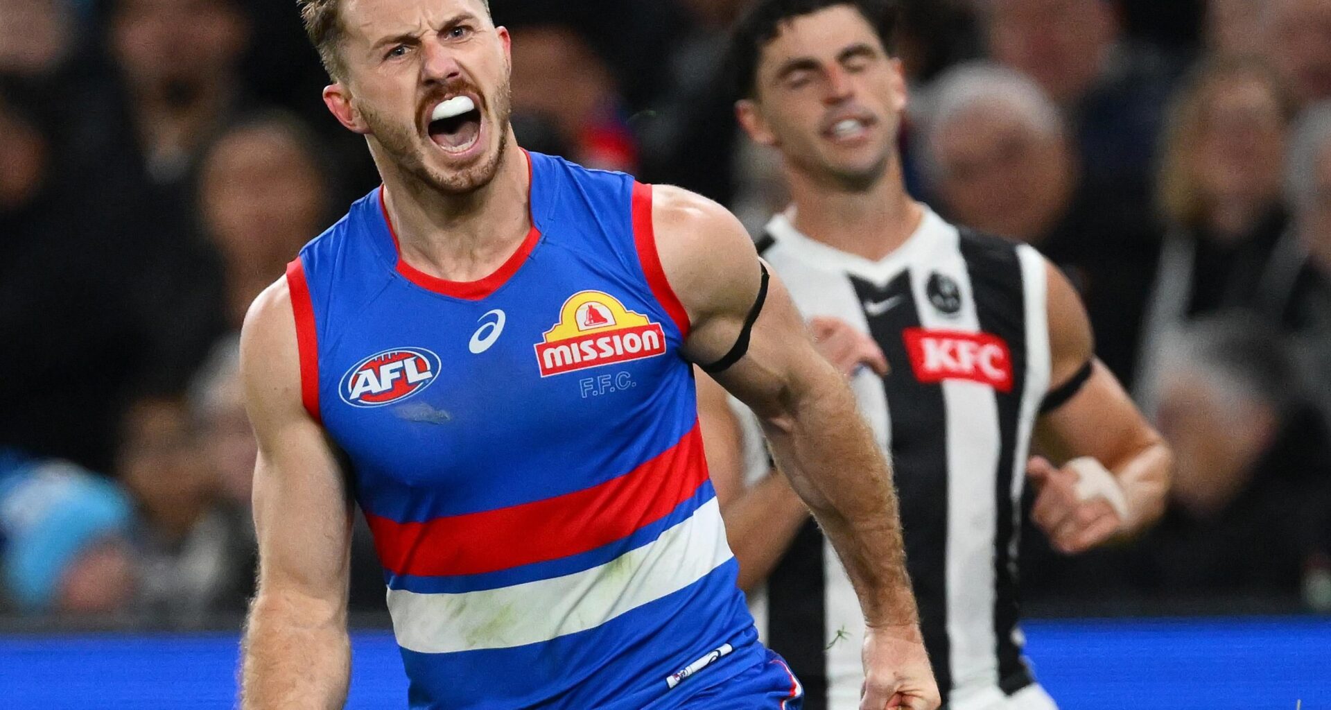 Dogs hang on to claim a cliffhanger against charging Pies