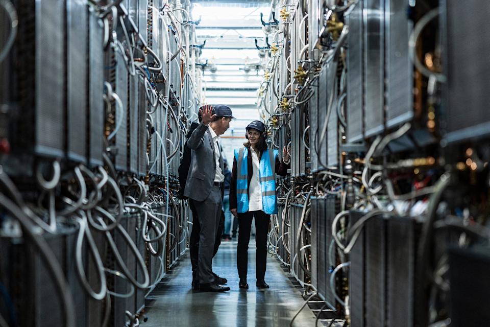 Minister Delegate for artificial intelligence and digital technologies Clara Chappaz (R) and Managing Director of OVHCloud, Benjamin Revcolevschi take part in a governmental visit at the data centre of French company OVHcloud in Roubaix, northern France on April 3, 2025. (Photo by Sameer Al-DOUMY / AFP) (Photo by SAMEER AL-DOUMY/AFP via Getty Images)