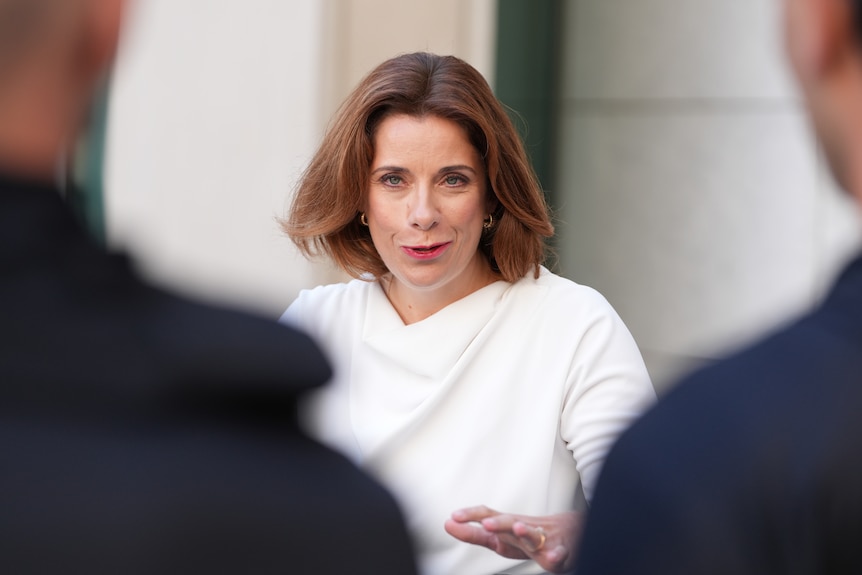 Anika Wells in white.