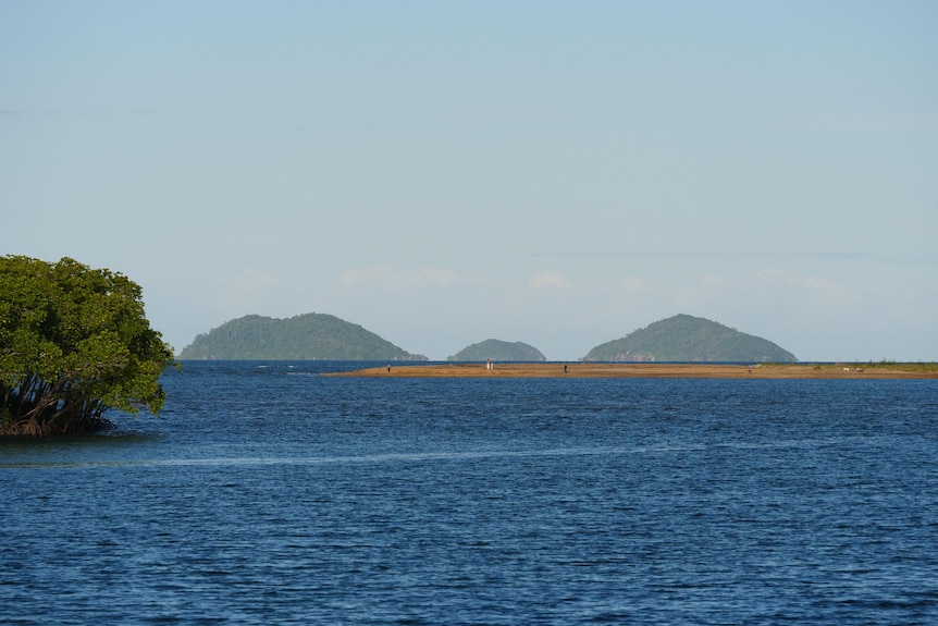 a view of islands and headland from a river