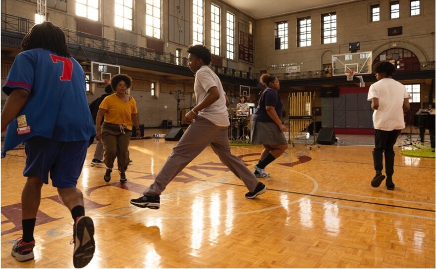 Young performers on a basketball court