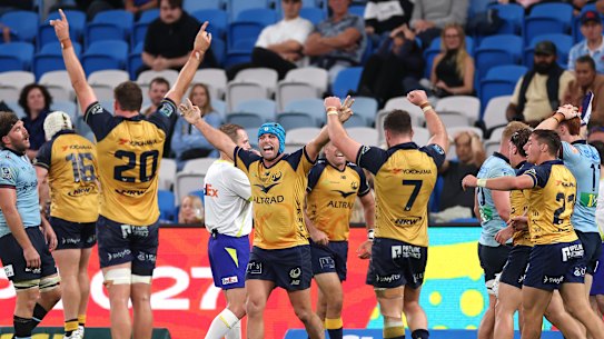The Western Force celebrate during their win over the Waratahs.