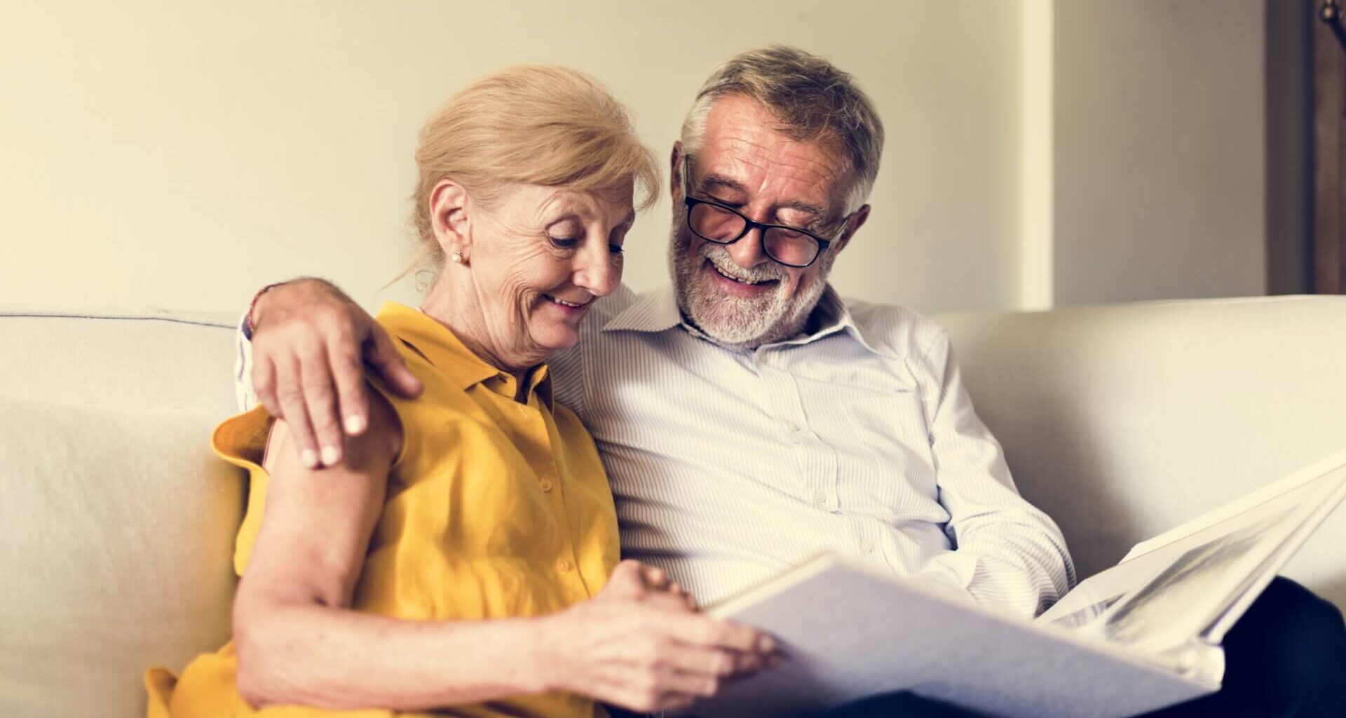 A senior or retired couple going over their finances to look at budget, spending, retirement plans and more.