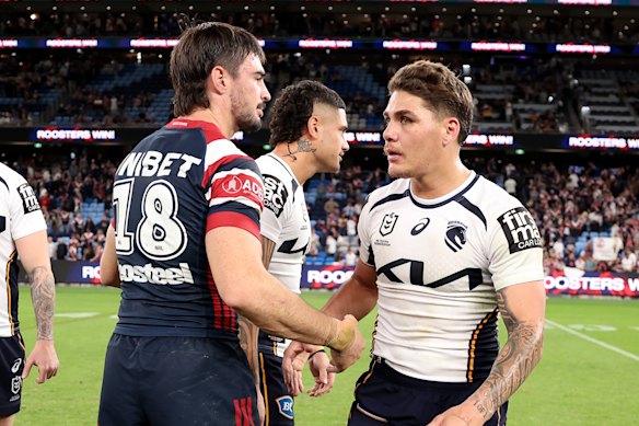 Cody Ramsey and Broncos star Reece Walsh shake hands on Saturday night.