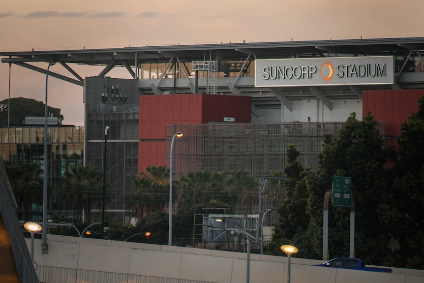 Outside of Suncorp Stadium pictured at dusk.