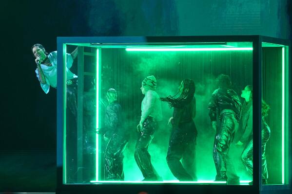 Soren Torpegaard Lund from Denmark performs the song "For Vi Gar Hjem" during the Grand Final of the 70th Eurovision Song Contest in Vienna, Austria, Saturday, May 16, 2026. (AP Photo/Martin Meissner)