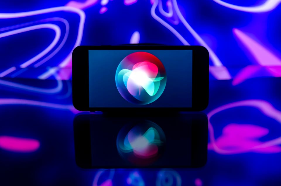 In this photo illustration, an Apple Siri logo is seen...