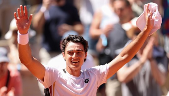 Adam Walton celebrates his victory over Daniil Medvedev.