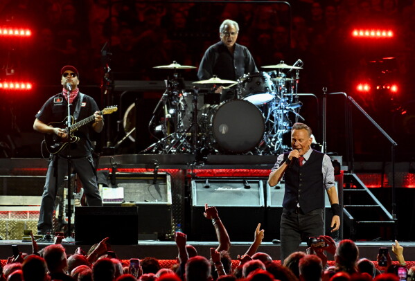 Bruce Springsteen, right, and the E Street Band perform during the "Land of Hope and Dreams" tour at Madison Square Garden on Monday, May 11, 2026, in New York. (Photo by Evan Agostini/Invision/AP)