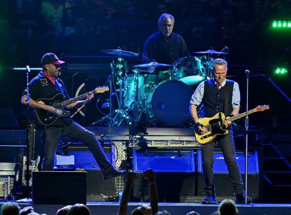 Tom Morello, from left, Max Weinberg and Bruce Springsteen perform during the "Land of Hope and Dreams" tour at Madison Square Garden on Monday, May 11, 2026, in New York. (Photo by Evan Agostini/Invision/AP)