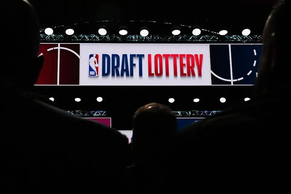 People attend the NBA basketball draft lottery in Chicago, Sunday, May 10, 2026. (AP Photo/Nam Y. Huh)