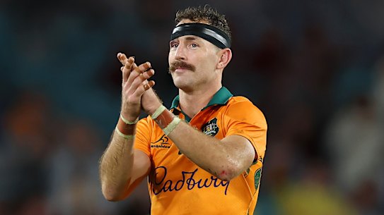 Nic White of the Wallabies applauds the fans after being substituted off.