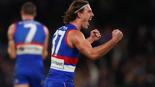 Michael Sellwood of the Bulldogs celebrates on the final siren