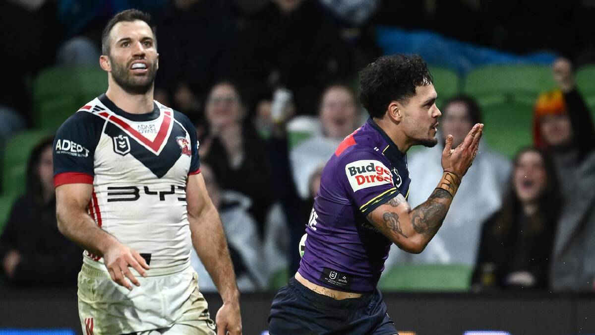 Melbourne's win over the Roosters was sealed with a kiss after Moses Leo's long-range try. (Joel Carrett/AAP PHOTOS)