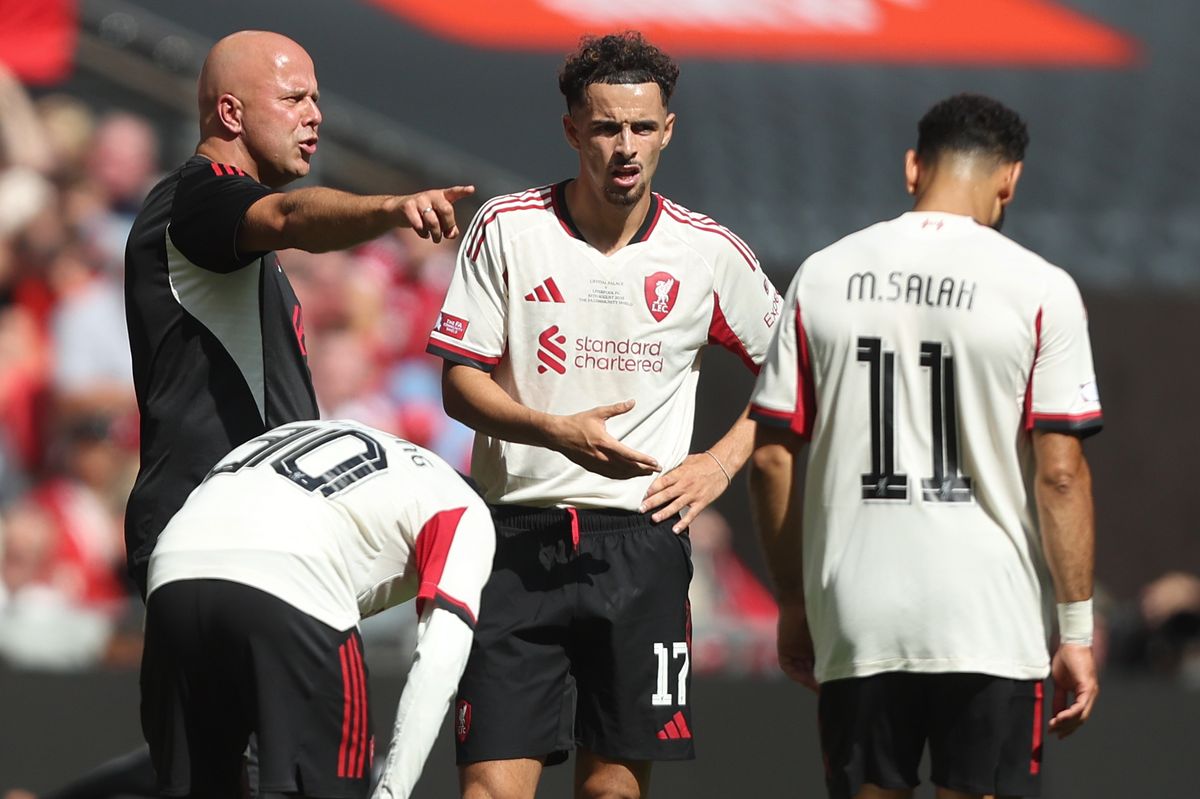 Liverpool manager Arne Slot gives instructions to Curtis Jones during the 2025 FA Community Shield match between Crystal Palace and Liverpool at Wembley Stadium on August 10, 2025 in London, England.