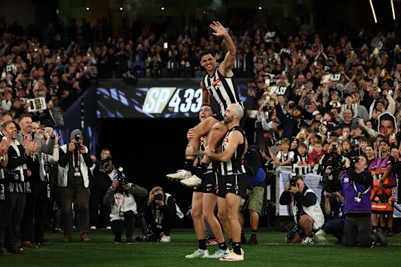 Pendlebury was chaired off the MCG by great mates and premiership teammates Steele Sidebottom and Jeremy Howe.
