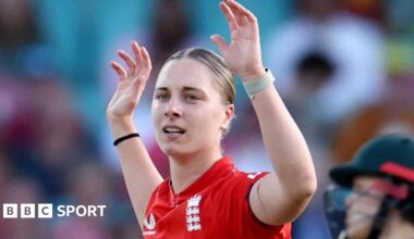 Freya Kemp holds her arms aloft