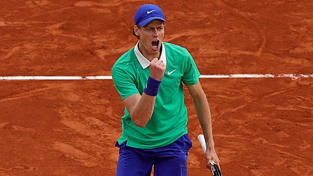 Jannik Sinner of Italy celebrates against Carlos Alcaraz of Spain.