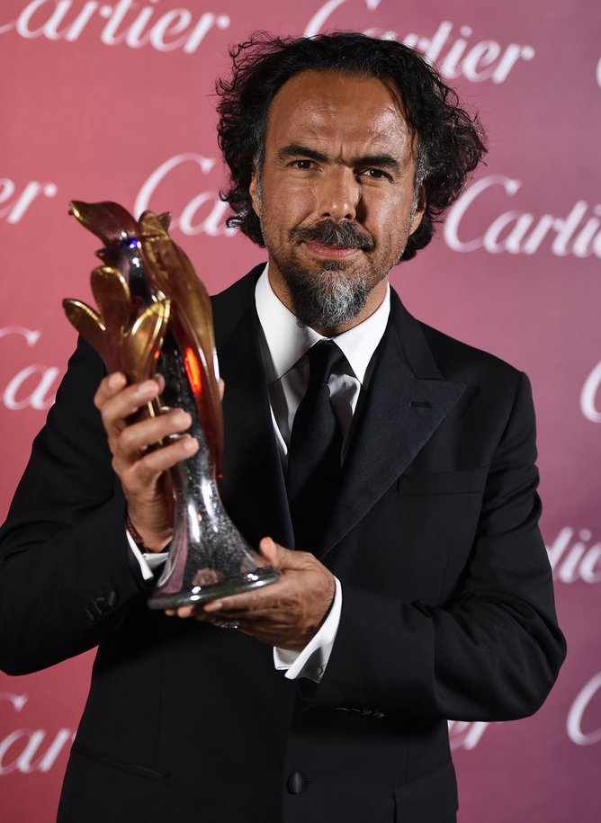 Alejandro Gonzalez Inarritu, winner of the director of the year award for "Birdman" poses in the press room at the 26th annual Palm Springs International Film Festival Awards Gala on Saturday, Jan. 3, 2015, in Palm Springs, Calif. (Photo by Jordan Strauss/Invision/AP)