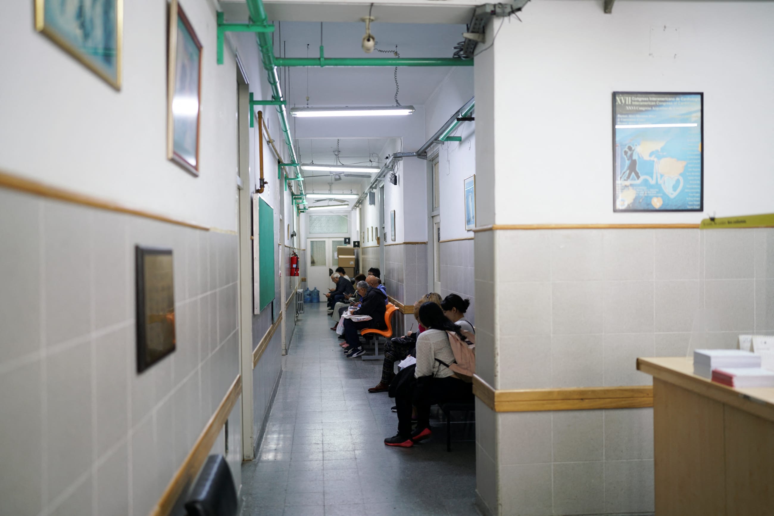 People are seen in a waiting room before receiving medical checks at the Hospital de Clinicas, in Buenos Aires, Argentina, on October 25, 2024.