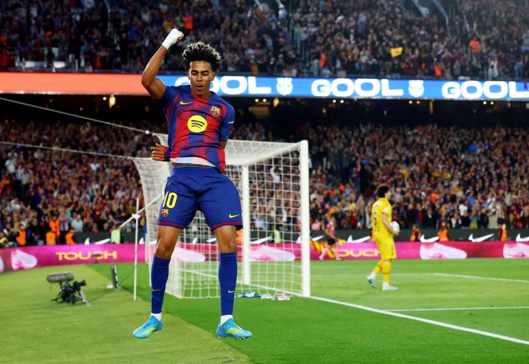 Barcelona's Lamine Yamal celebrates scoring their third goal in the La Liga match against Espanyol