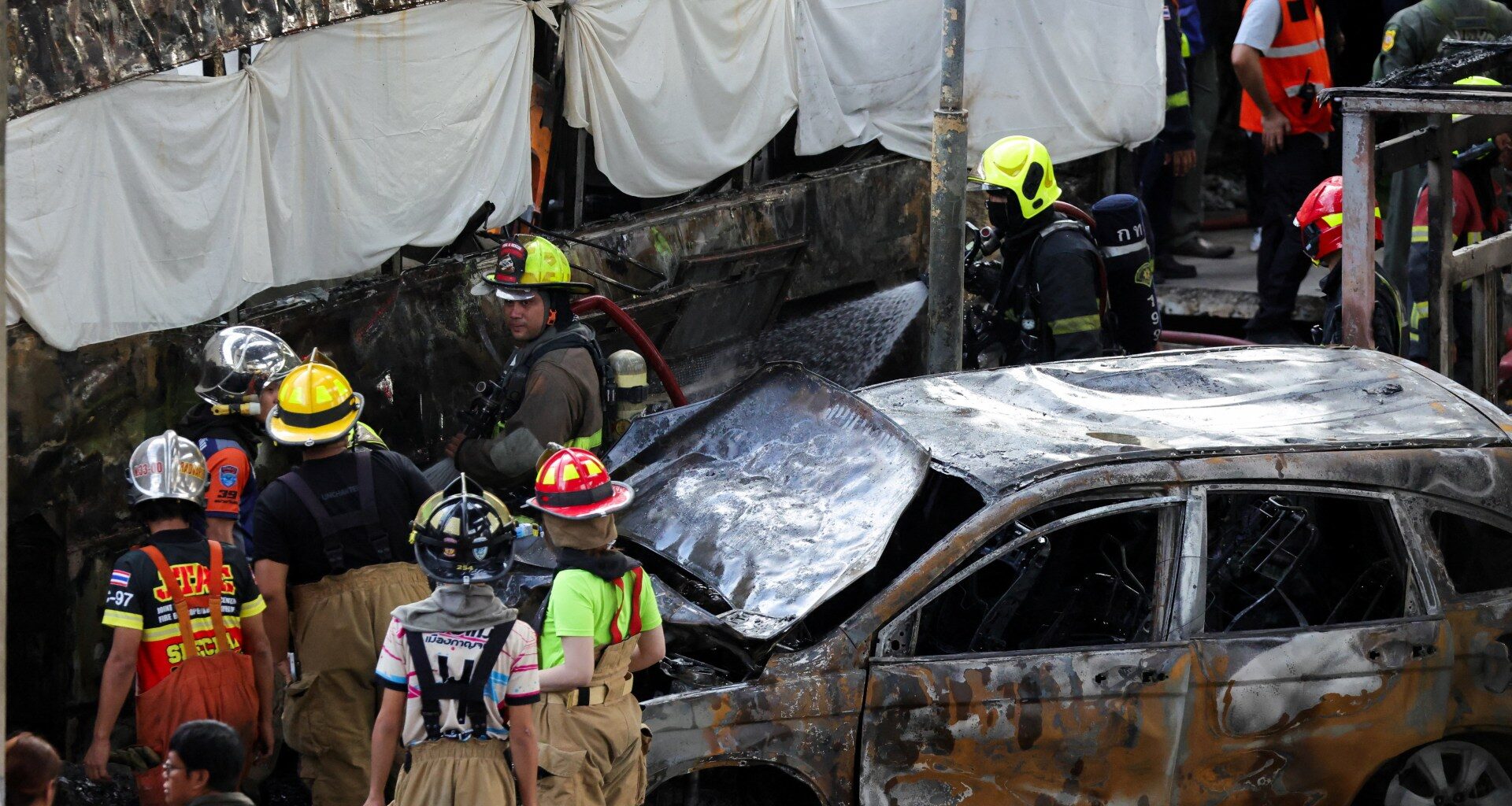 At least eight killed, 35 injured as train hits bus in Bangkok | News