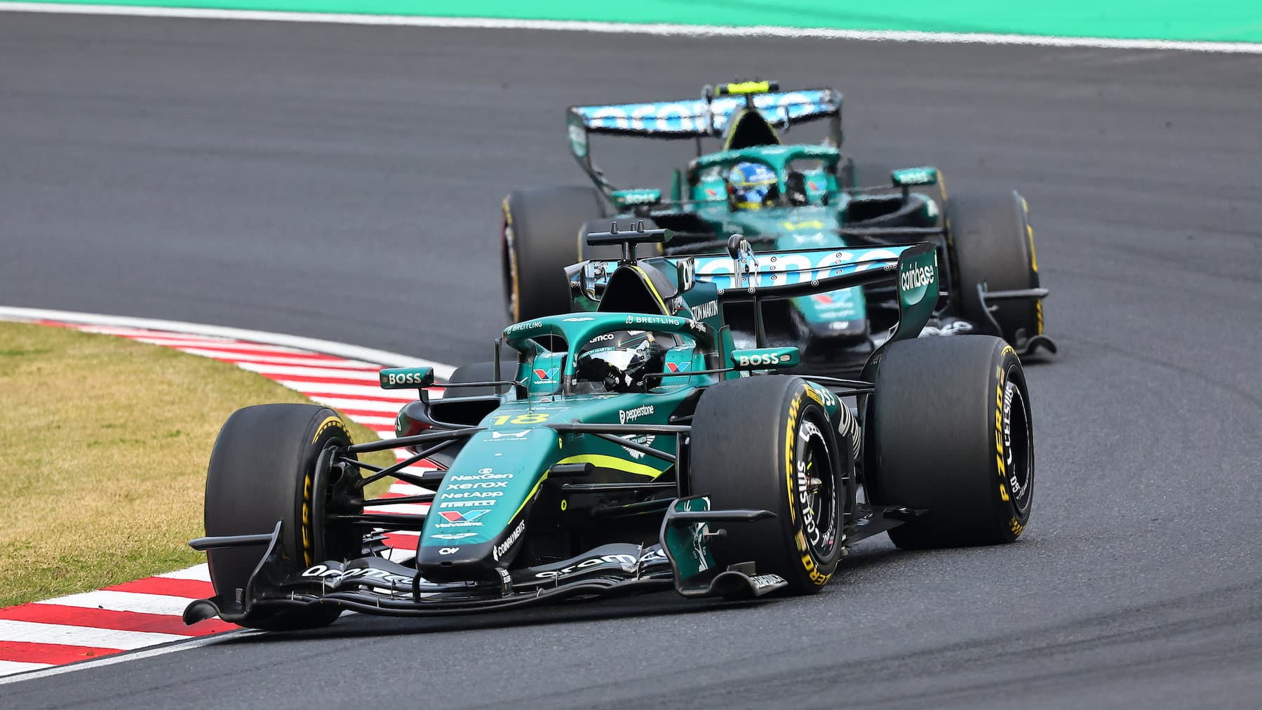 Lance Stroll and Fernando Alonso (both Aston Martin-Honda) in the 2026 Japanese Grand Prix
