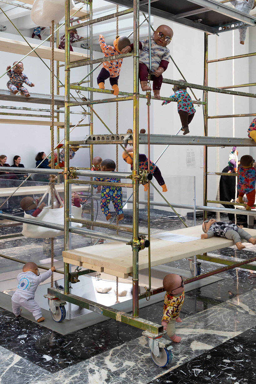 208 baby dolls animate japan pavilion in ei arakawa-nash's playful ode to care - 5