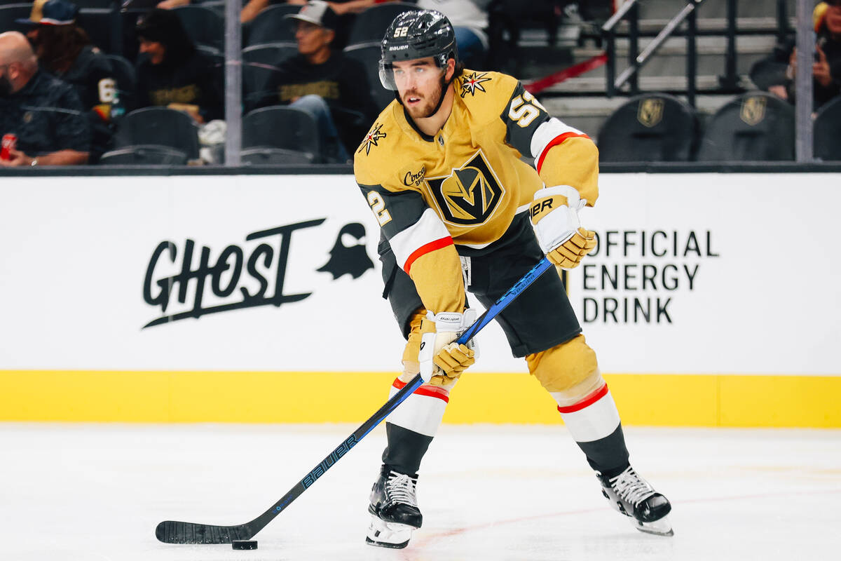 Golden Knights defenseman Dylan Coghlan (52) skates the puck during a preseason NHL hockey game ...