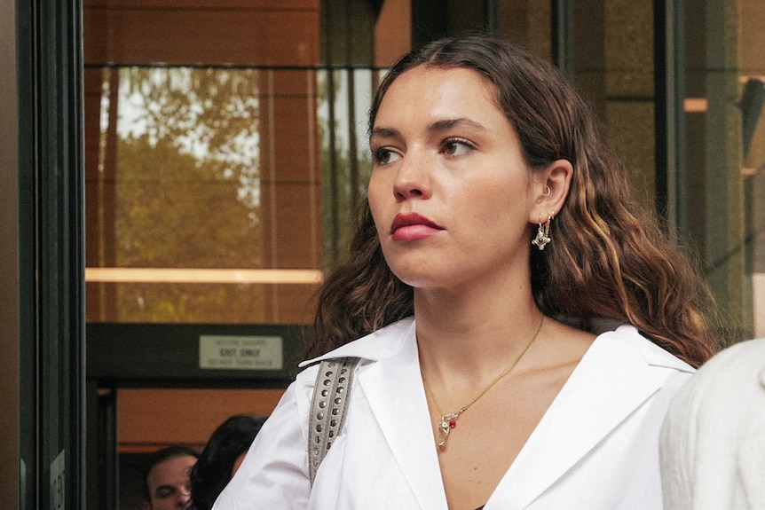 Charlotte MacInnes in a white shirt and silver jewellery.