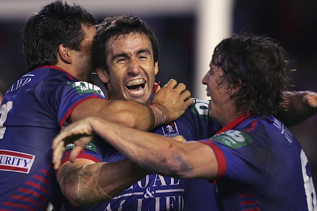 Andrew Johns celebrates a Brian Carney try in Newcastle Knights final win over Manly in 2006.