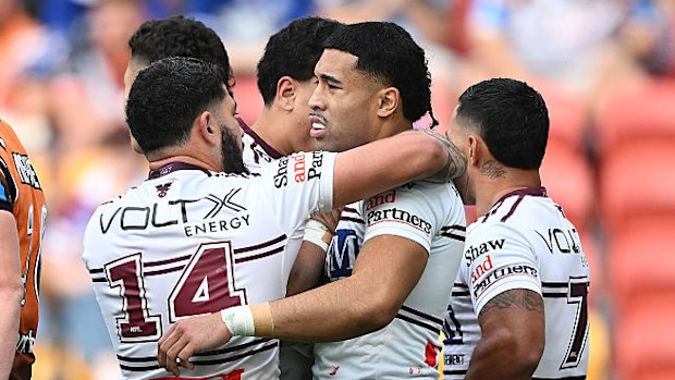 The Manly Sea Eagles celebrate a try.