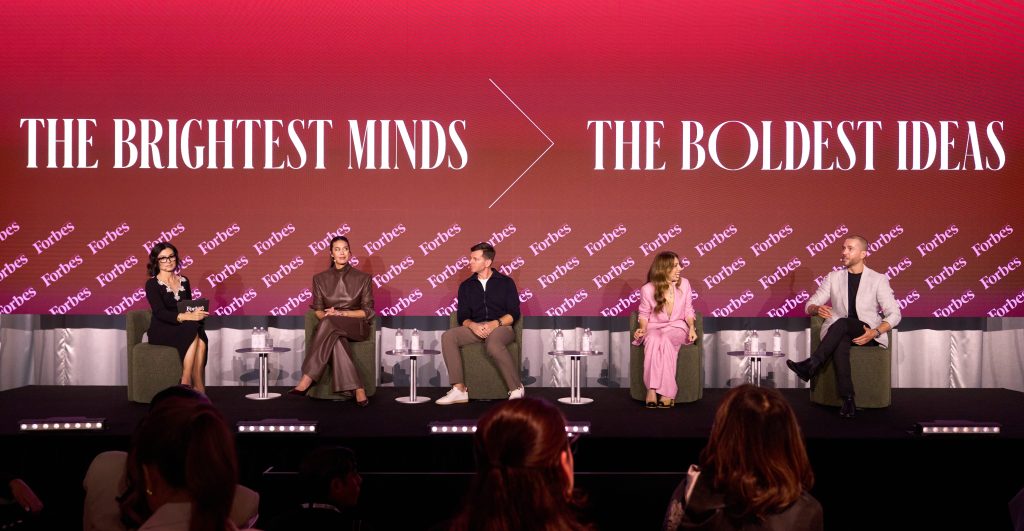 Felicity McVeigh moderates a panel on Longevity featuring Megan Gale, Dr Adam Brown, Bahar Etminan, and Nick Bell at the 2026 Forbes Women Summit presented by Lancome. Image: Forbes Australia